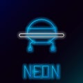 Glowing neon line UFO flying spaceship icon isolated on black background. Flying saucer. Alien space ship. Futuristic Royalty Free Stock Photo