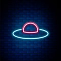 Glowing neon line UFO flying spaceship icon isolated on brick wall background. Flying saucer. Alien space ship Royalty Free Stock Photo