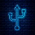 Glowing neon line USB symbol icon isolated on brick wall background. Vector Royalty Free Stock Photo