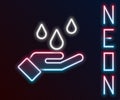 Glowing neon line Washing hands with soap icon isolated on black background. Washing hands with soap to prevent virus Royalty Free Stock Photo