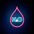 Glowing neon line Water drop with H2O icon isolated on brick wall background. Water formula. Colorful outline concept
