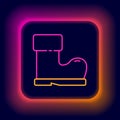 Glowing neon line Waterproof rubber boot icon isolated on black background. Gumboots for rainy weather, fishing