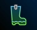 Glowing neon line Waterproof rubber boot icon isolated on black background. Gumboots for rainy weather, fishing