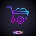 Glowing neon line Wheelbarrow icon isolated on black background. Tool equipment. Agriculture cart wheel farm. Vector