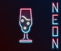Glowing neon line Wine glass icon isolated on black background. Wineglass icon. Goblet symbol. Glassware sign. Happy Royalty Free Stock Photo