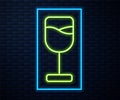 Glowing neon line Wine glass icon isolated on brick wall background. Wineglass icon. Goblet symbol. Glassware sign Royalty Free Stock Photo