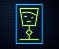 Glowing neon line Wine glass icon isolated on brick wall background. Wineglass sign. Vector Illustration. Royalty Free Stock Photo