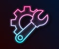 Glowing neon line Wrench spanner and gear icon isolated on black background. Adjusting, service, setting, maintenance