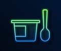 Glowing neon line Yogurt container with spoon icon isolated on blue background. Yogurt in plastic cup. Vector