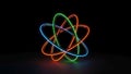 Atomic structure with intersecting loops in blue green orange and Royalty Free Stock Photo