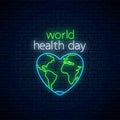 Glowing neon medicine concept sign with map outline in heart shape and text. World Health Day banner, symbol Royalty Free Stock Photo