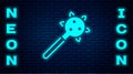 Glowing neon Medieval chained mace ball icon isolated on brick wall background. Morgenstern medieval weapon or mace with