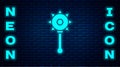 Glowing neon Medieval chained mace ball icon isolated on brick wall background. Medieval weapon. Vector