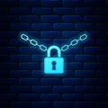 Glowing neon Metal chain and lock icon isolated on brick wall background. Padlock and steel chain. Vector Royalty Free Stock Photo