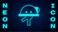 Glowing neon Miner helmet icon isolated on brick wall background. Vector Royalty Free Stock Photo