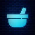 Glowing neon Mortar and pestle icon isolated on brick wall background. Vector Royalty Free Stock Photo