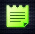 Glowing neon Notebook icon isolated on brick wall background. Spiral notepad icon. School notebook. Writing pad. Diary