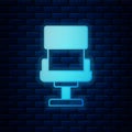 Glowing neon Office chair icon isolated on brick wall background. Armchair sign. Vector Royalty Free Stock Photo