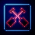 Glowing neon Paddle icon isolated on blue background. Paddle boat oars. Vector Royalty Free Stock Photo