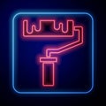 Glowing neon Paint roller brush icon isolated on black background. Vector Royalty Free Stock Photo