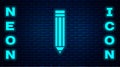 Glowing neon Pencil icon isolated on brick wall background. Drawing and educational tools. School office symbol. Vector Royalty Free Stock Photo