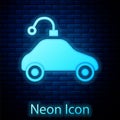 Glowing neon Radio controlled car toy icon isolated on brick wall background. Control remote car toy. Vector