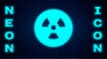 Glowing neon Radioactive icon isolated on brick wall background. Radioactive toxic symbol. Radiation hazard sign. Vector Royalty Free Stock Photo