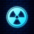 Glowing neon Radioactive icon isolated on brick wall background. Radioactive toxic symbol. Radiation Hazard sign. Vector Royalty Free Stock Photo