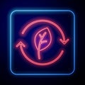 Glowing neon Recycle symbol with leaf icon isolated on black background. Circular arrow icon. Environment recyclable go Royalty Free Stock Photo