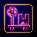Glowing neon Scale with cardboard box icon isolated on black background. Logistic and delivery. Weight of delivery Royalty Free Stock Photo