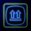 Glowing neon This side up icon isolated on blue background. Two arrows indicating top side of packaging. Cargo handled Royalty Free Stock Photo