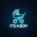 Glowing neon sign with congratulations on the birth of a baby boy. Baby carriage symbol Royalty Free Stock Photo