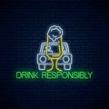 Glowing neon sign of drink responsibly call with car silhouette and glass of beer. Prevent drunk driving symbol Royalty Free Stock Photo