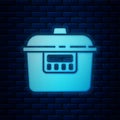 Glowing neon Slow cooker icon isolated on brick wall background. Electric pan. Vector