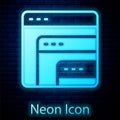 Glowing neon Software, web developer programming code icon isolated on brick wall background. Javascript computer script Royalty Free Stock Photo