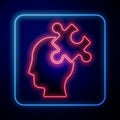 Glowing neon Solution to the problem in psychology icon isolated on blue background. Puzzle. Therapy for mental health