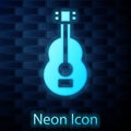 Glowing neon Spanish guitar icon isolated on brick wall background. Acoustic guitar. String musical instrument. Vector Royalty Free Stock Photo
