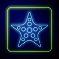 Glowing neon Starfish icon isolated on blue background. Vector Royalty Free Stock Photo