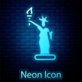 Glowing neon Statue of Liberty icon isolated on brick wall background. New York, USA. Vector