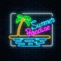 Glowing neon summer paradise sign with palm, beach and ocean in rectangle frame on dark brick wall background.