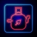 Glowing neon Teapot with leaf icon isolated on black background. Vector Royalty Free Stock Photo