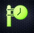 Glowing neon Train station clock icon isolated on brick wall background. Vector Royalty Free Stock Photo