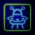 Glowing neon UFO flying spaceship icon isolated on blue background. Flying saucer. Alien space ship. Futuristic unknown Royalty Free Stock Photo