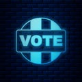 Glowing neon Vote icon isolated on brick wall background. Vector