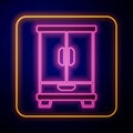 Glowing neon Wardrobe icon isolated on black background. Cupboard sign. Vector