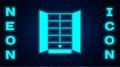 Glowing neon Wardrobe icon isolated on brick wall background. Cupboard sign. Vector