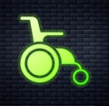 Glowing neon Wheelchair for disabled person icon isolated on brick wall background. Vector Royalty Free Stock Photo