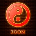 Glowing neon Yin Yang symbol of harmony and balance icon isolated on brick wall background. Vector Royalty Free Stock Photo