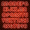 Glowing orange neon alphabet and digits. Royalty Free Stock Photo