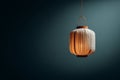 Glowing paper lantern against dark background Royalty Free Stock Photo